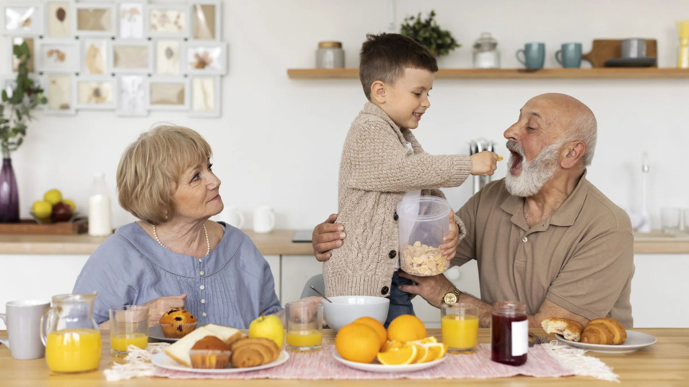Grandparents sitting with their grandson